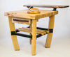 Custom solid hardwood kitchen island by Paul Diamond with bow-shaped legs and a raised serving counter