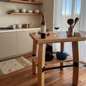 Wooden kitchen island with wine bottle and glass in a modern kitchen.